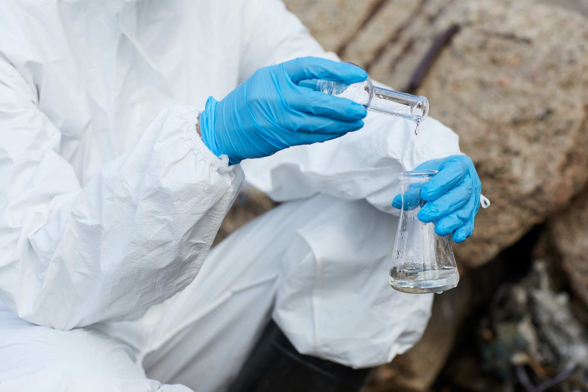 Woman taking samples of water